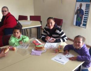 Some of the very little children colouring in the We Can Help pictures.  Too young, obviously, to do the course.